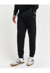 Gant Sportinio stiliaus kelnės &raquo;REG SHIELD SWEATPANTS&laquo; su Logostickerei unterhalb des Bunds