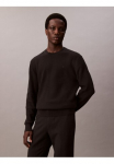 Calvin Klein Megztinis &raquo;LS TXTR CTTN CRWNK S&laquo; su Mar&scaron;kinėliai apvalia i&scaron;kirpte